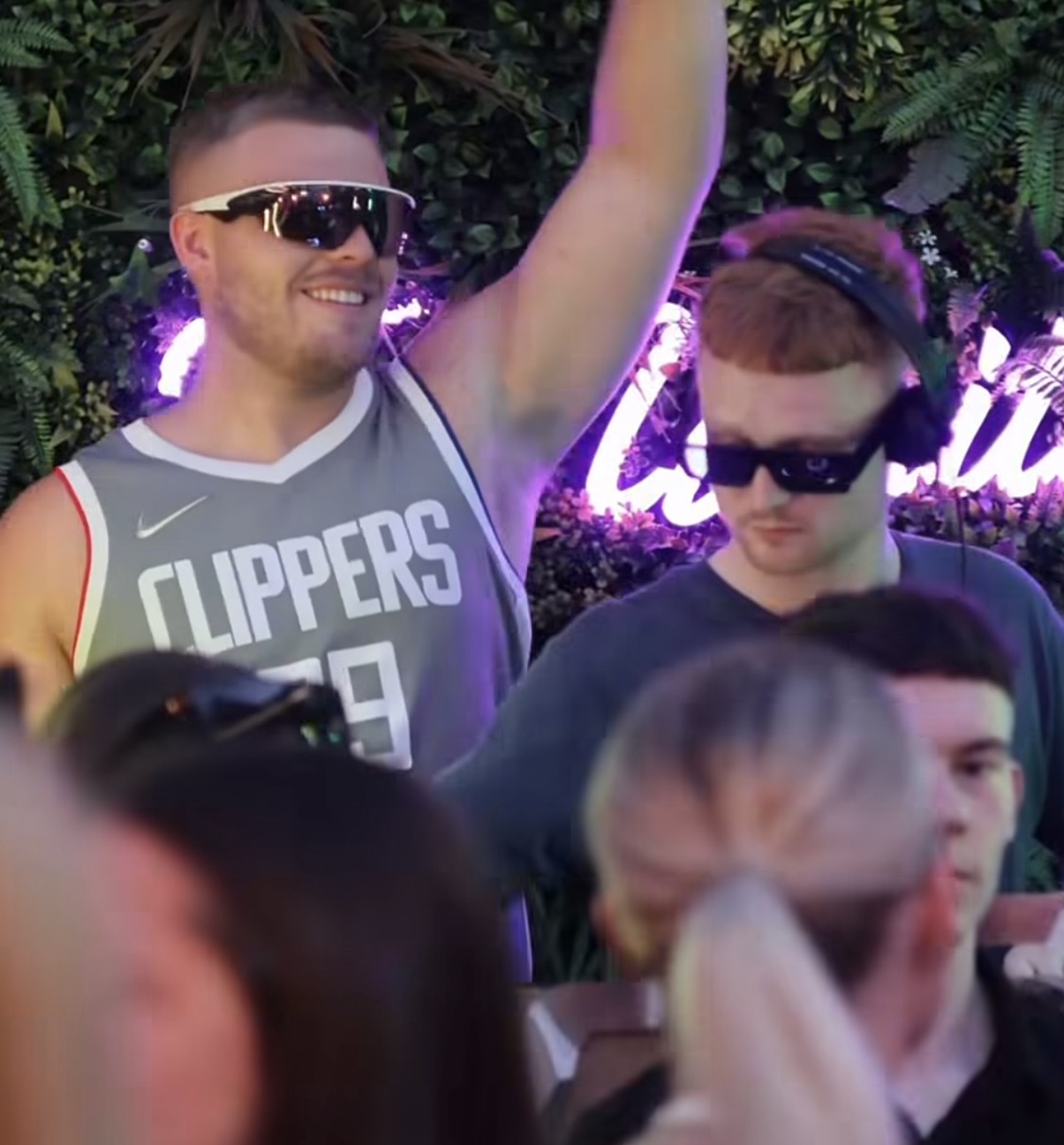 DJ booth with crowd, wide